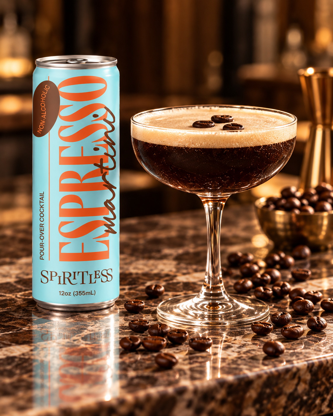 Spiritless non-alcoholic Espresso Martini in its new turquoise 12 oz can beside a coupe garnished with three coffee beans
